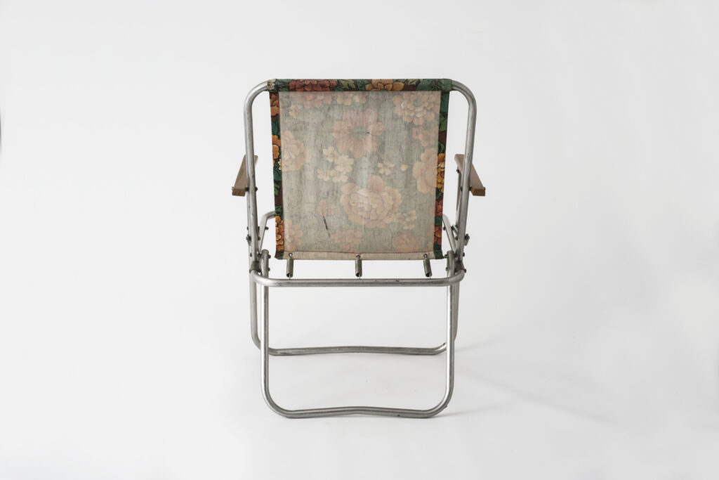 Folding chair with fabric seat, unfold, backside