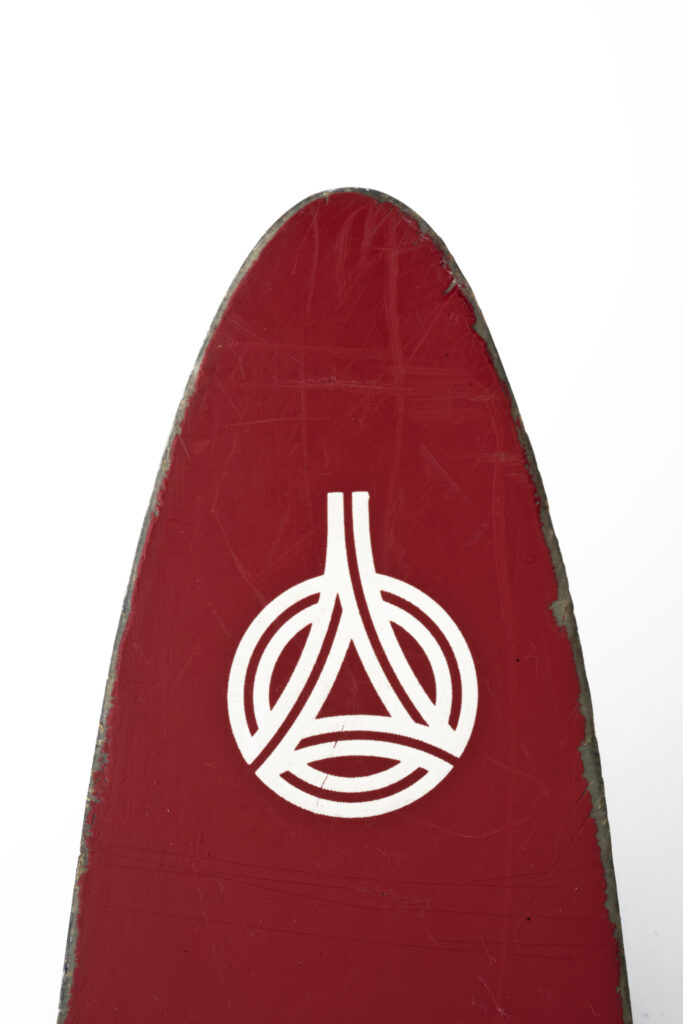 Ski by Germina in red, detail, front end of the ski with logo