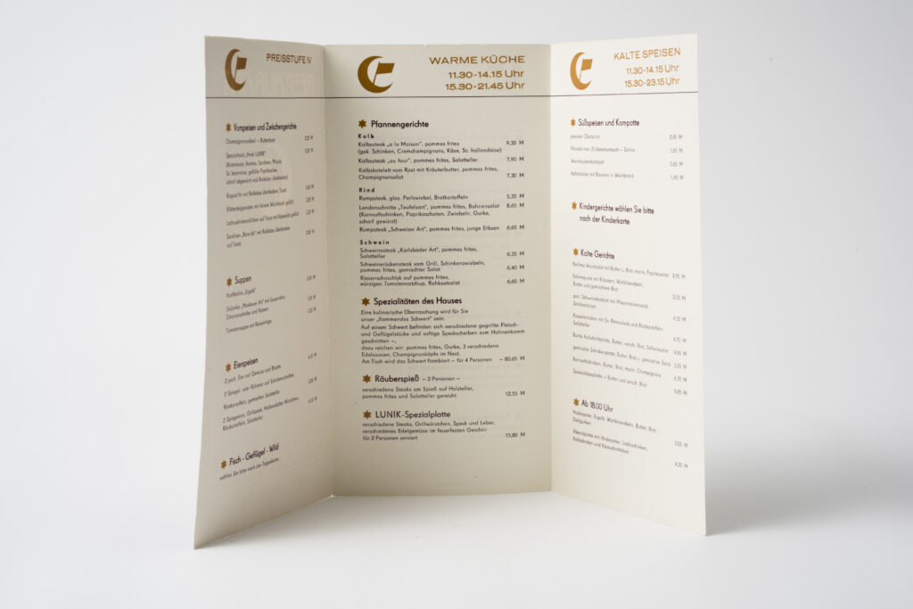 Menu of the hotel Lunik, dark red design, inside