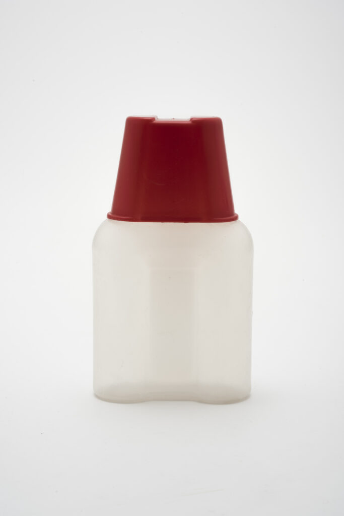 rectangular-shaped drinking bottle made of transparent plastic with a red lid