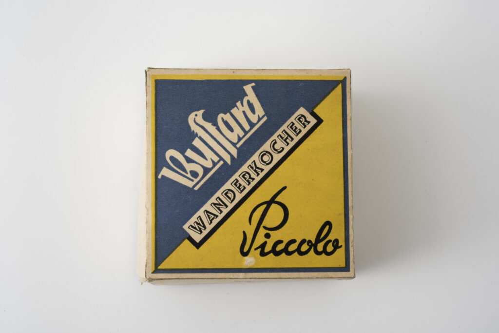 Wanderkocher "Piccolo" der Firma Bussard, Karton
